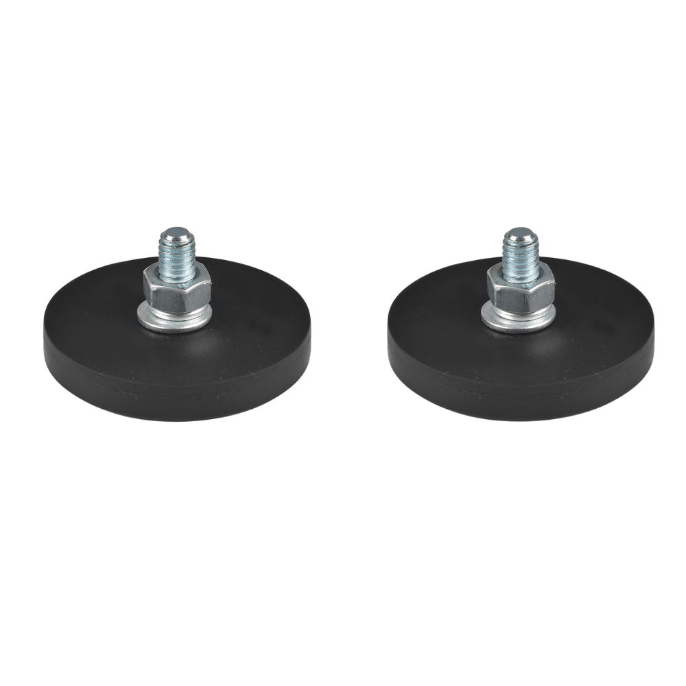 Two black rubber pads with metal bolts on a white background